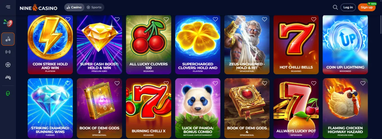 Grid de iconuri jocuri NineCasino: Coin Strike, Super Cash Boost, All Lucky Clovers, Zeus Unchained, Hot Chilli Bells și altele, pe un fundal albastru închis